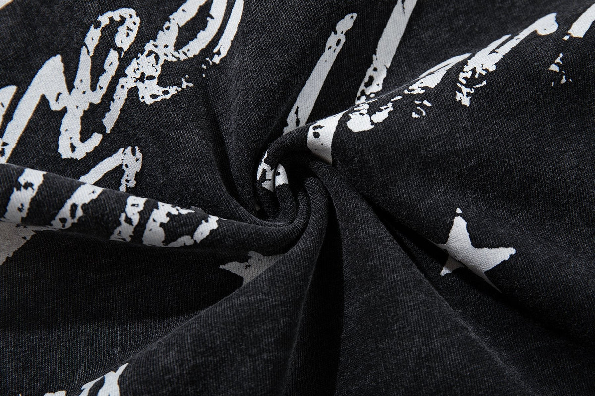 MAJESTIK Washed Black Tour Graphic T-Shirt — fabric_closeup