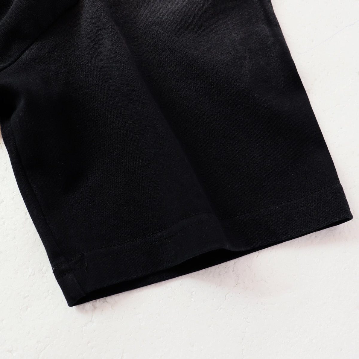 AMIRI The Chateau Badge Graphic T-Shirt — fabric_closeup